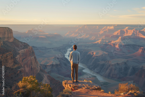 Man Contemplating Grand Canyon Landscape at Sunset