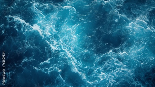 Blue ocean water texture background. Turquoise foam pattern