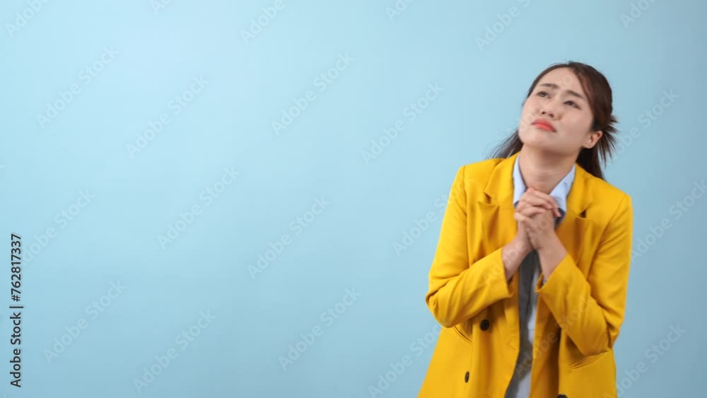 The Asian girl walked back and forth with a worried look on her face
