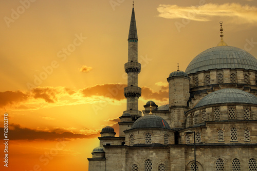 The New Mosque or Yeni Cami located on the Golden Horn embankment in the Eminonu district of Istanbul, Turkey. photo