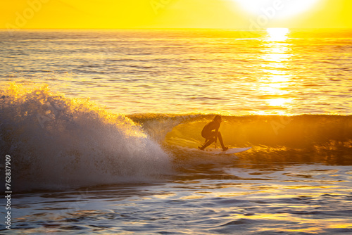 Surfer Rides Wave in Southern California