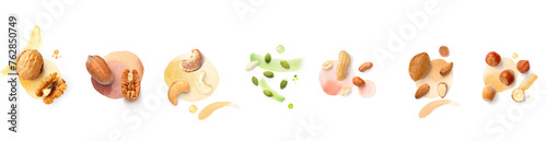 Creative layout made of pecan, almond, pumpkin seeds, walnut, cashew, hazelnut on the white background with watercolor spots. Flat lay. Macro concept of nuts and seeds. photo