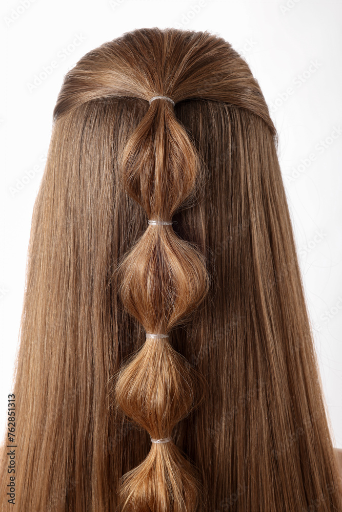 Woman with braided hair on white background, back view Woman with braided hair on white background, back view