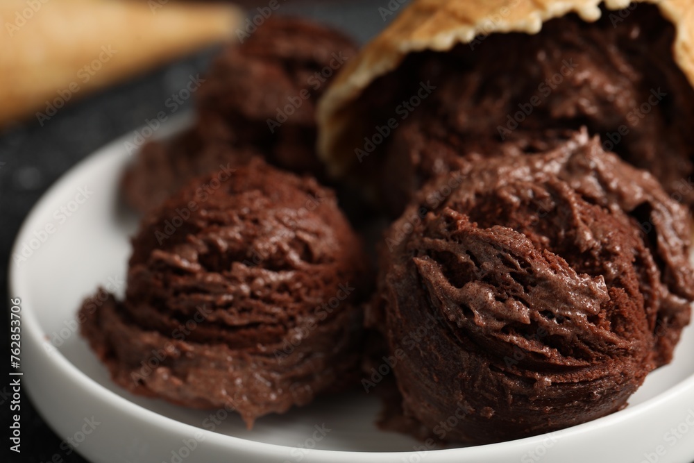 Tasty ice cream scoops on plate, closeup Tasty ice cream scoops on plate, closeup