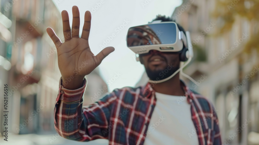 African american man in vr glasses, playing video games with virtual reality headset, trying to touch something with hand African american man in vr glasses, playing video games with virtual reality headset, trying to touch something with hand