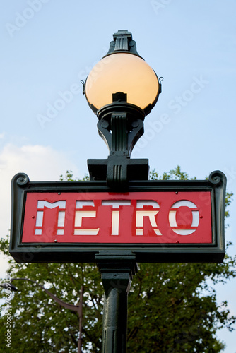 Lit Globe on Iron Pole with Sign for Paris Metro Subway