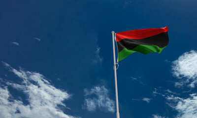Juneteenth 19 nineteen day flag blue sky background wallpaper copy space cloudy slavery equality human right african american event culture emancipation racism politic government campaign heritage 