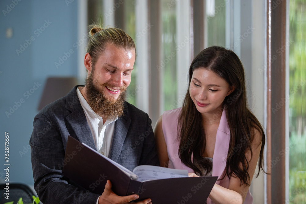 Business people reading discuss documents working together analysis accounting strategy corporate consulting. businessperson discussion agreement. Business people reading discuss documents working together analysis accounting strategy corporate consulting. businessperson discussion agreement.