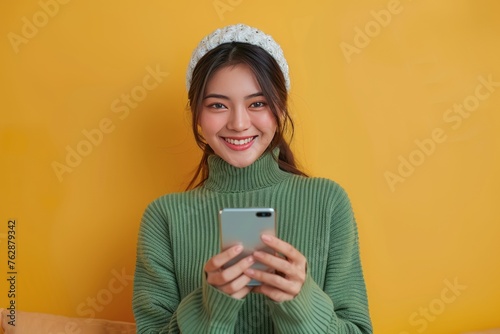 smiling beautiful asian woman green sweater