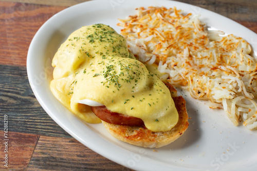 Vászonkép A closeup view of a plate of eggs Benedict.