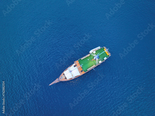 Aerial view of a ship with a green roof in Indonesia