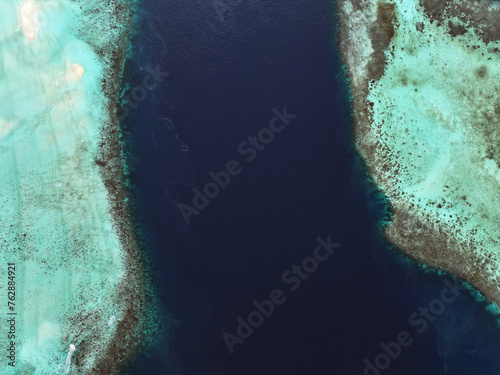 Channel between two reefs and sandbars off Kri Island