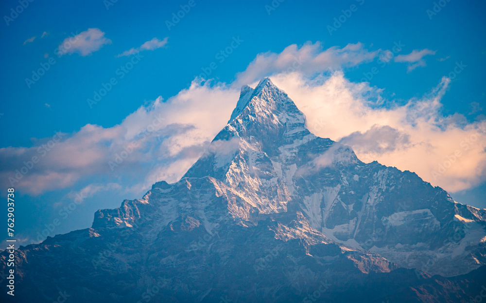 landscape view with snow covered Mount Machhapuchhre range in Nepal.