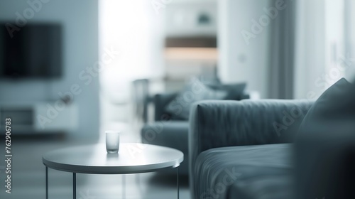 Blurred view of light living room with grey sofas and coffee table : Generative AI © Generative AI
