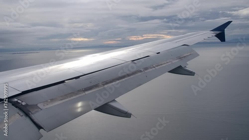 Fully Extended Flaps Airplane Wing in Landing Configuration in Flight