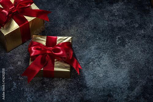Golden Gift Boxes  On Dark Background