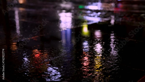 Urban road at night on a rainy day. Puddles, reflections, night, railroad crossing, intersections, etc. 雨の日、夜の都市部の道路。水たまり、リフレクション、夜、踏切、交差点 photo