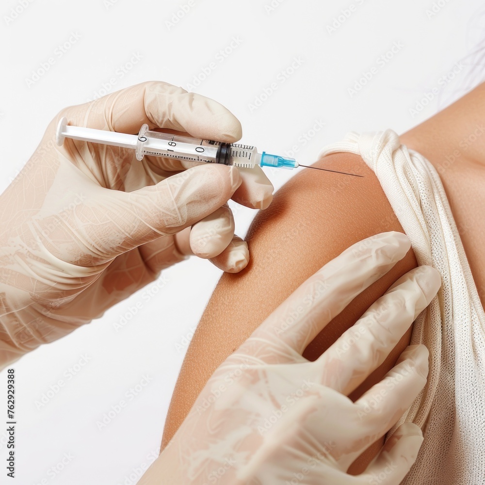 Close-up of Healthcare Worker Administering COVID-19 Vaccine Injection to Patients Arm with Syringe and Needle on White Background. Vaccination Process Concept in Medical Setting. Close-up of Healthcare Worker Administering COVID-19 Vaccine Injection to Patients Arm with Syringe and Needle on White Background. Vaccination Process Concept in Medical Setting.