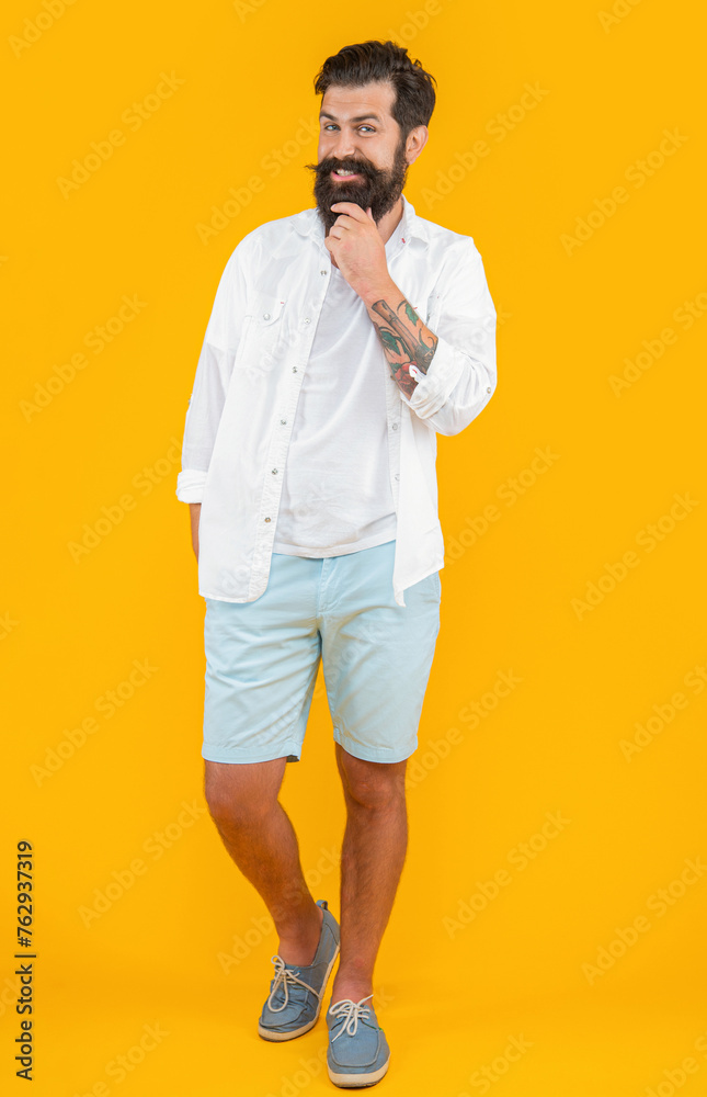 photo of bearded guy wearing summer fashion. bearded guy isolated on yellow. bearded guy photo of bearded guy wearing summer fashion. bearded guy isolated on yellow. bearded guy