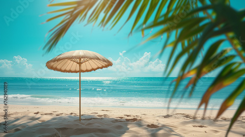 Umbrella on Sunlit Tropical Sandy Beach. © vlntn