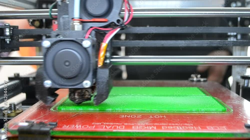 3D printer prints an object. The process of printing model on 3D printer. Model printed on 3D printer from molten plastic. 3D printing technologies. Additive progressive new modern printing technology 3D printer prints an object. The process of printing model on 3D printer. Model printed on 3D printer from molten plastic. 3D printing technologies. Additive progressive new modern printing technology