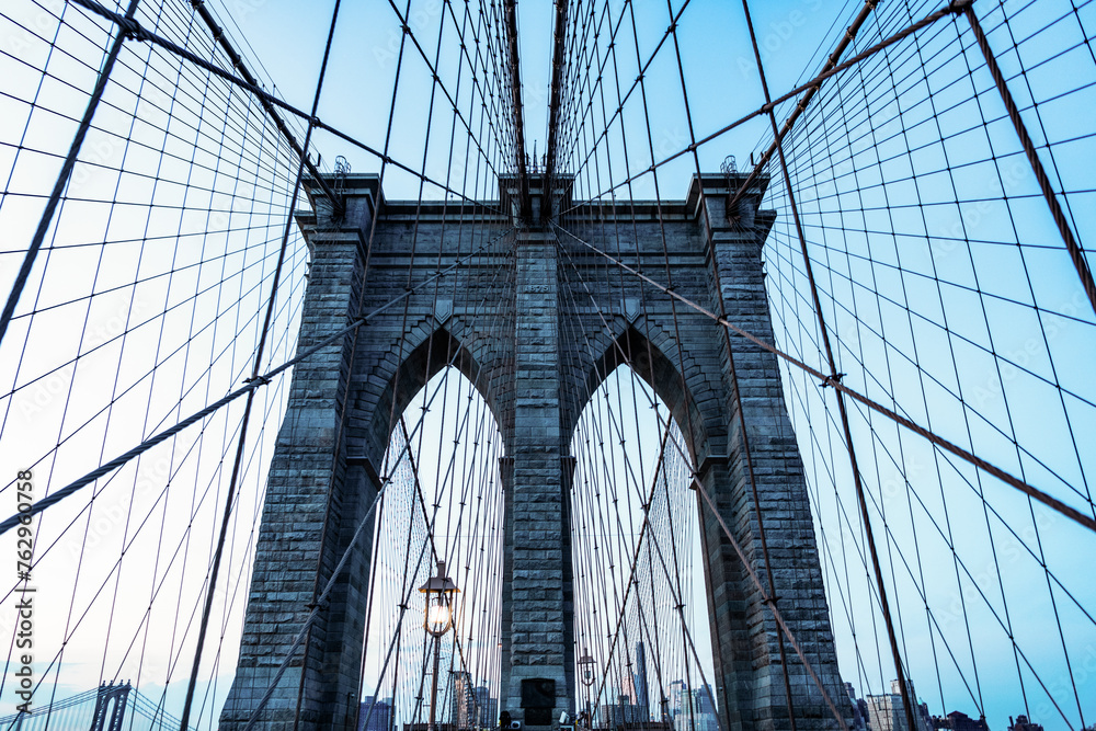 Fototapeta premium Brooklyn bridge in ny, usa. brooklyn bridge in new york. amazing scenery of brooklyn bridge over skyscrapers in metropolis. brooklyn bridge of new york city. Famous tourist spot
