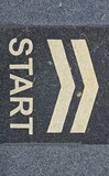 start sign on asphalt