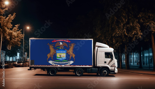 Michigan  flag on the back of white truck against the backdrop of the city. Truck  transport  freight transport. Freight and Logistics Concept