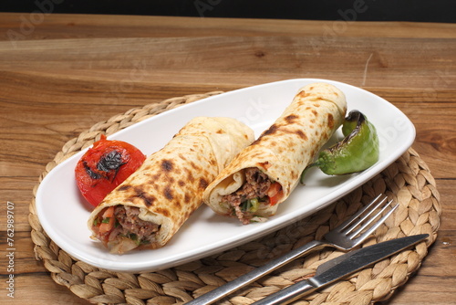 Adana kebab wrapped in lavash bread 