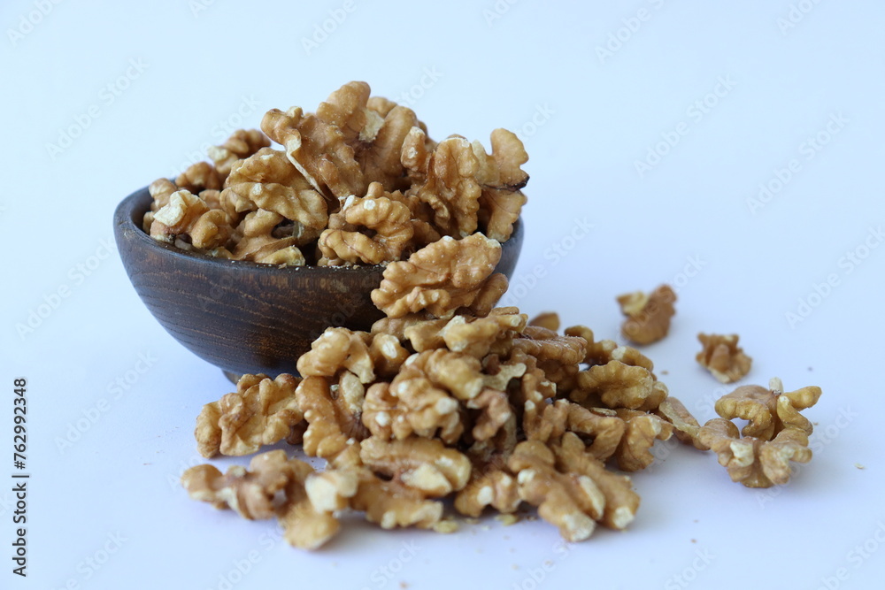 walnuts are displayed in traditional and glass containers