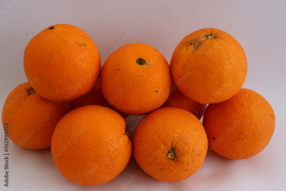 Fresh ripe oranges as background, top view Fresh ripe oranges as background, top view