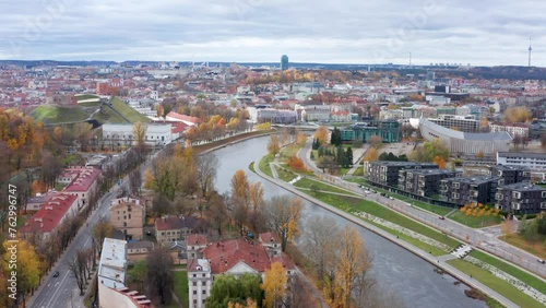 Drone aerial view of Vilnius city on autumn day. Neris river flows. VILNIUS, LITHUANIA - 10 10 2023.  photo