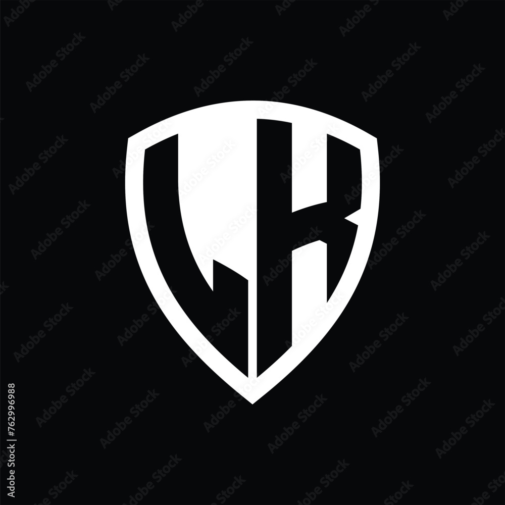 LK monogram logo with bold letters shield shape with black and white color design LK monogram logo with bold letters shield shape with black and white color design