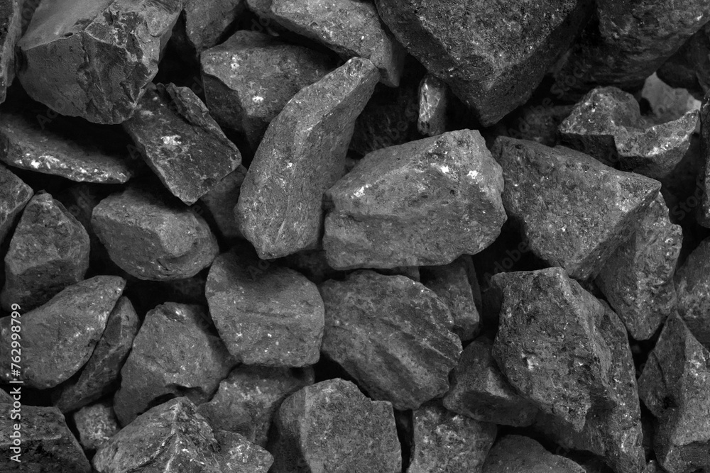 Coal. black crushed stone background texture close-up. rubble in a heap.