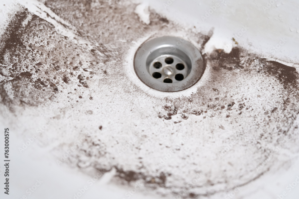 white sink drain with dirt close up white sink drain with dirt close up