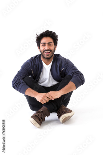 Happy Indian man looking at camera.