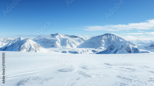 Pristine Snowy Landscape, Majestic Mountains under Blue Sky © r3mmm