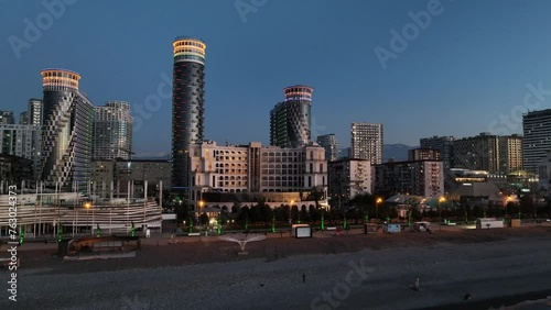 Flying over modern luxury hotel Colosseum Marina on Sherif Khimshiashvili street. Batumi, Georgia photo