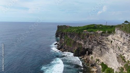 Aerial shot of incredible cliffs in Uluwatu - Bali. photo