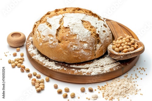 Bread with soy flour on kitchen bench with soy beans and white isolated background. Front view.