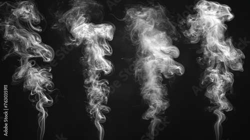 Smoke set isolated on black background. White cloudiness, mist, or smog background. Collection of white smoke on a black background.