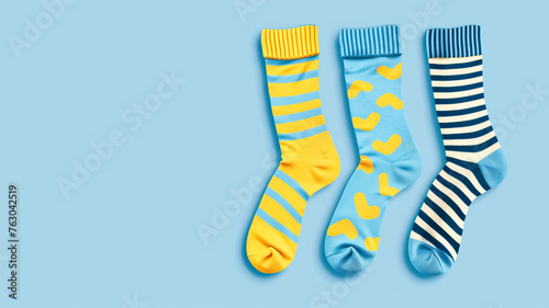 different colorful odd socks as a symbol for WDSD. Vector flat illustration. World Down Syndrome day. March 21.