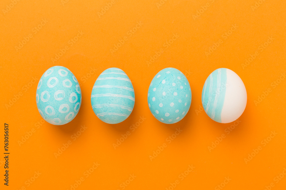 Blue easter eggs on color background, top view Blue easter eggs on color background, top view