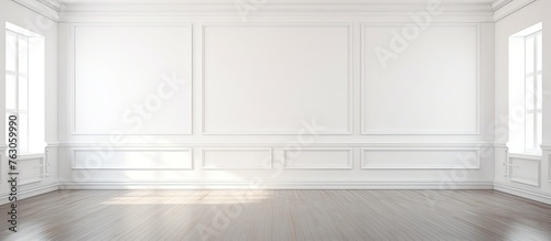 A room with white rectangular walls and hardwood flooring. The beige tint on the wood stain creates a symmetrical pattern, enhancing the rooms minimalist style