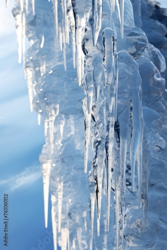 Icicles hanging from the side of a building, suitable for winter themes