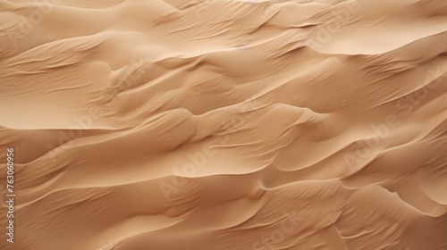 Close up of a sand dune with a clear sky in the background. Suitable for travel and nature concepts