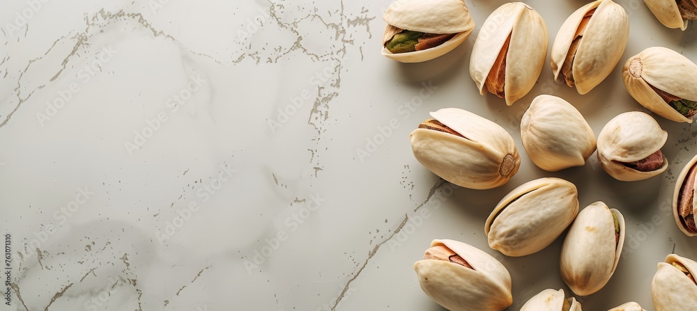 Pistachios on white table with abundant space for text, suitable for marketing and creative content Pistachios on white table with abundant space for text, suitable for marketing and creative content