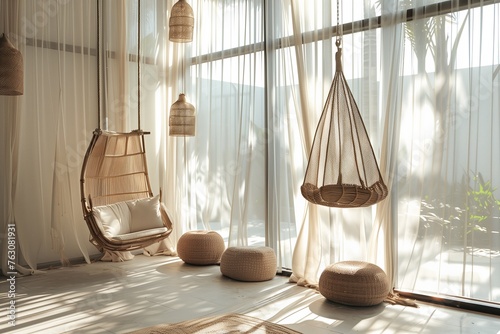 Natural light flooding through sheer curtains, highlighting a hanging swing chair and woven pendant lights. © Tahira