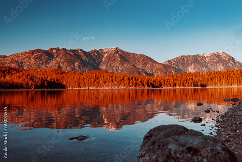 reflection of the mountain in lake with infrared photostyle photo