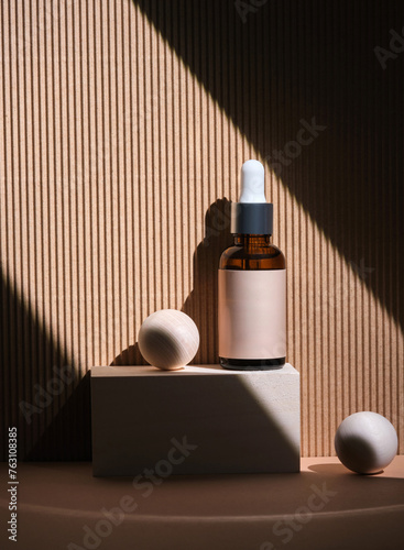 stylish image featuring a cosmetic bottle with a dropper, placed amid geometric shapes, bathed in natural sunlight creating beautiful shadows